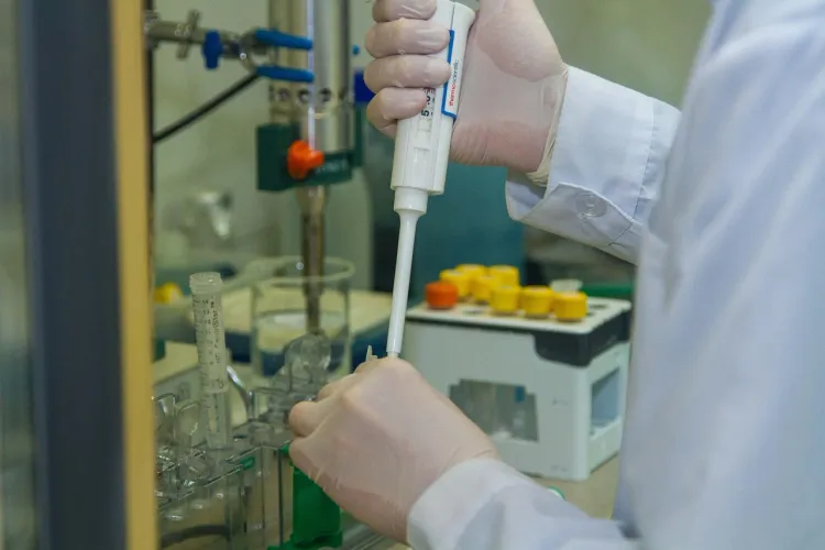 Picture of a scientist doing work that illustrates the importance of a lab notebook